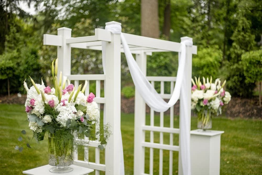 Traditional white arch with florals