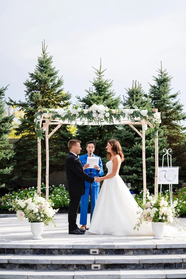 White birch canopy at a wedding ceremony