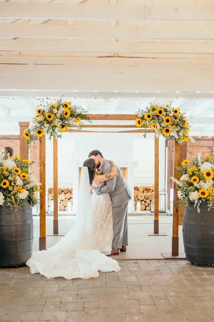 White birch wedding canopy at a ceremony