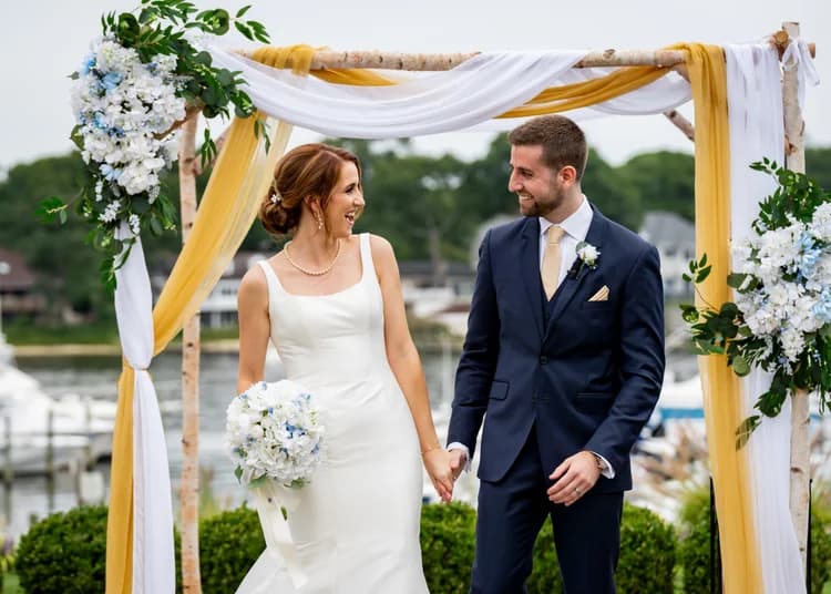 White birch canopy at an evening ceremony